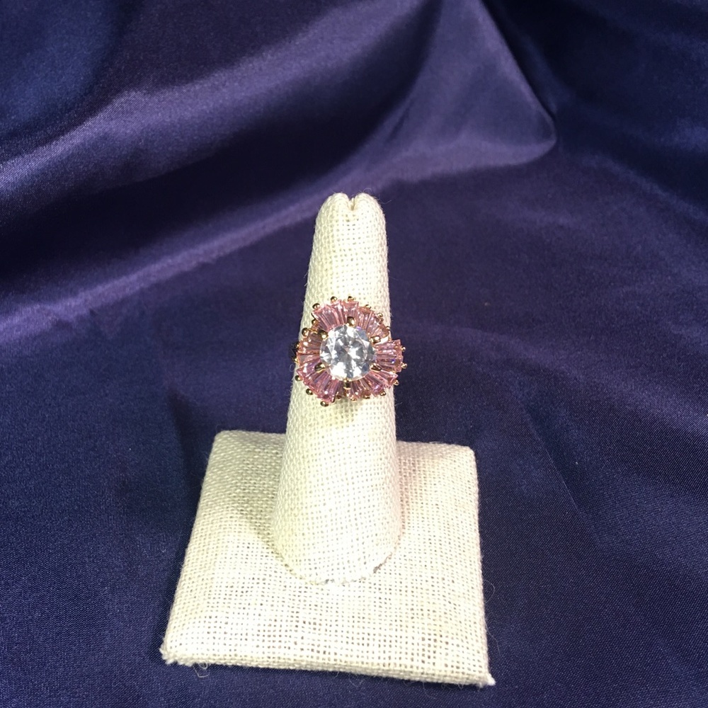 Gold ring with pink and clear stones
